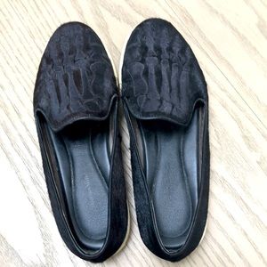 Black slip on sneakers